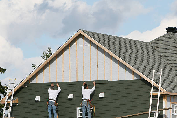 Professional Emergency Siding Repair technician working in New Bloomington, OH